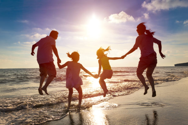 NZ Family Enjoying The Beach